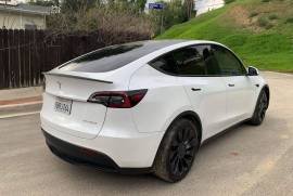 Tesla, Y performance